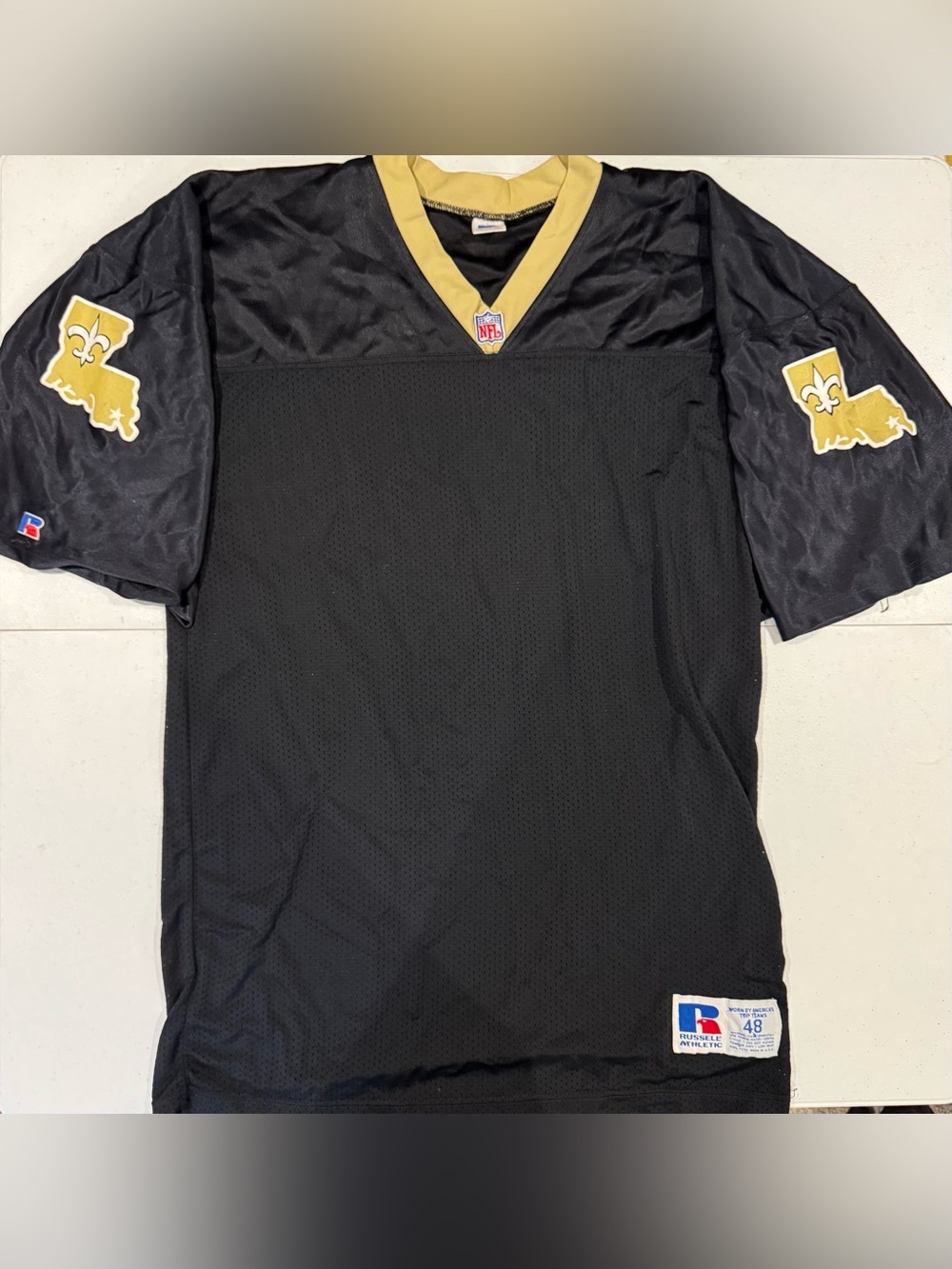 Vintage 90โs Russell Athletic New Orleans Saints NFL Football Jersey size 48